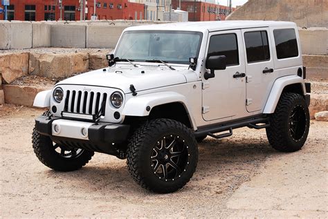 Silver Renegade Jeep Wrangler JK Sitting On Wide Fuel Off Road Wheels