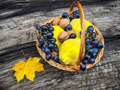 Premium Photo Yellow Autumn Leaves On Wood