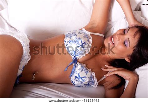 Стоковая фотография 56125495 Sexy Woman Lingerie Lying On Bed