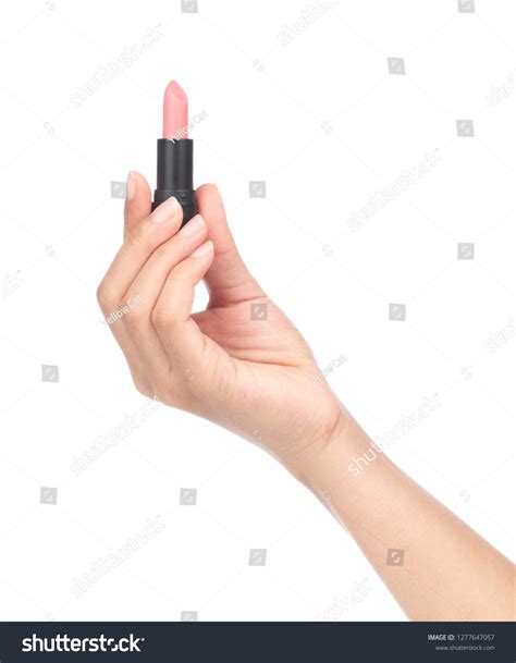 Hand Holding Nude Lipstick Tube Isolated Stock Photo Edit Now