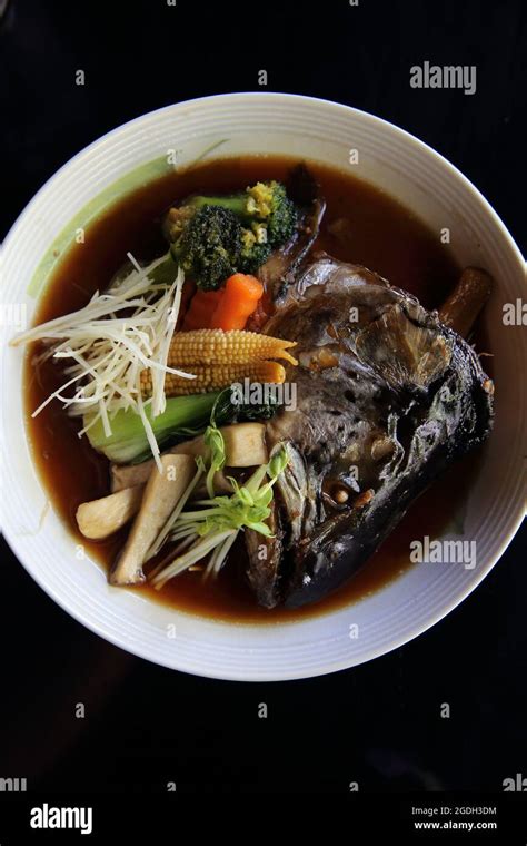 Japanese Food Bolied Head Fish With Sauce Stock Photo Alamy