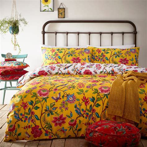 A Yellow Or White Reversible Floral Duvet Cover Set Beautifully