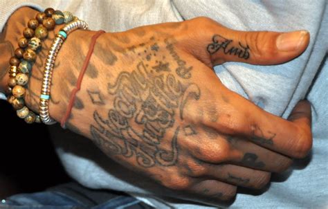 All Wiz Khalifa Tattoos Meanings - Amber Rose, Face & etc.