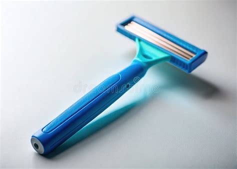 Effortless Smoothness a CloseUp View of a Modern Blue Womens Razor on a ...