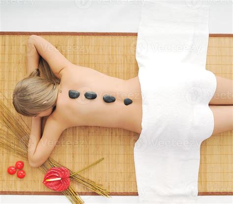 Massage With Hot Volcanic Stones Stock Photo At Vecteezy