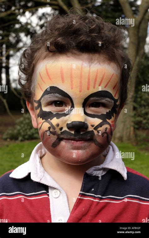 Small Boy Wearing Tiger Face Paint Makeup Stock Photo Alamy