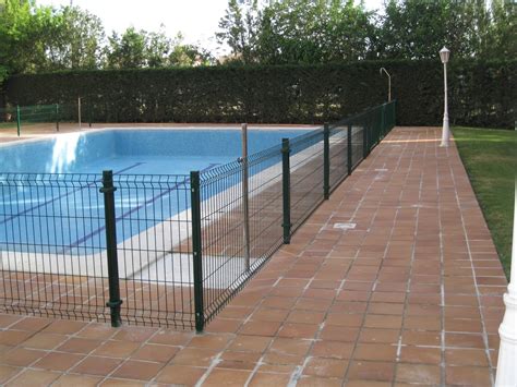 NORBEL CARPINTERIA METÄLICA Y ACERO INOXIDABLE CERRAMIENTO PISCINA CON