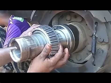 Rear Wheel Bearing Play Adjusting Hub S Greasing Process