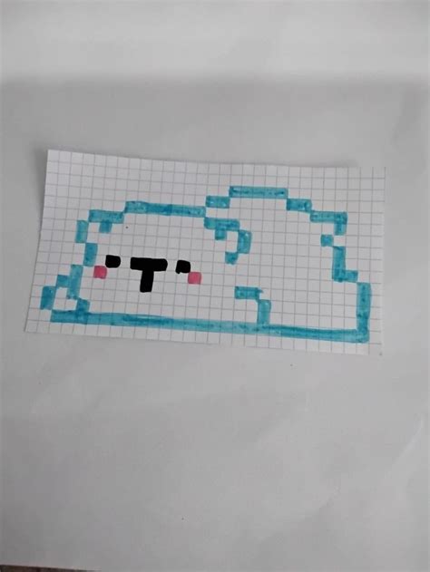 A Piece Of Paper That Has Some Type Of Pixel Art On It With Blue And