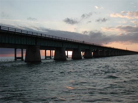 Sunset at the Seven Mile Bridge Photograph by Nancy Taylor | Fine Art ...