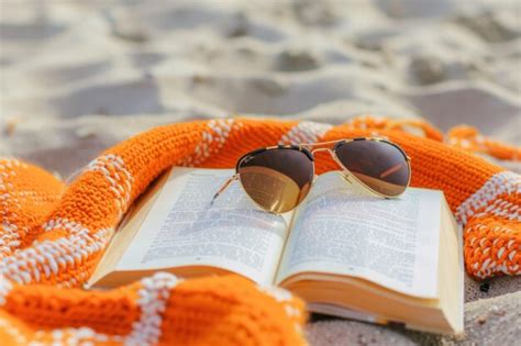 Premium Photo Book Sunglasses And Pareo On A Beach