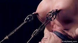 Busty Brunette Slave Nerine Mechanique Is Shackled On The Wooden Floor Gets Pussy Fucked With