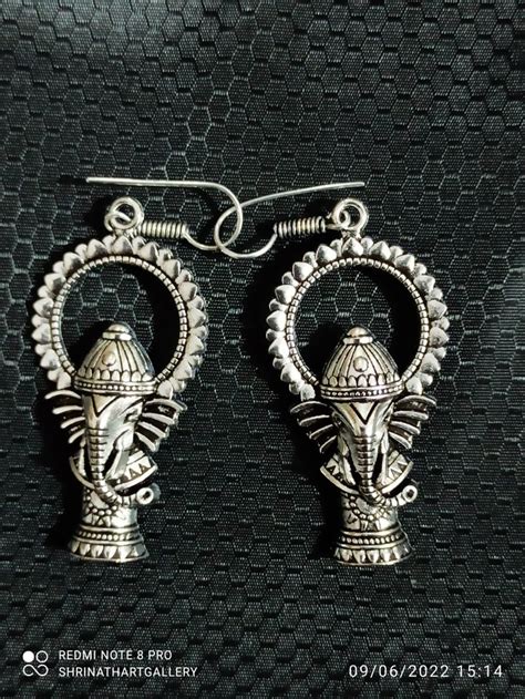 Oval Metal Shrinath Art Gallery Oxodised Ganesha Design Earrings At Rs