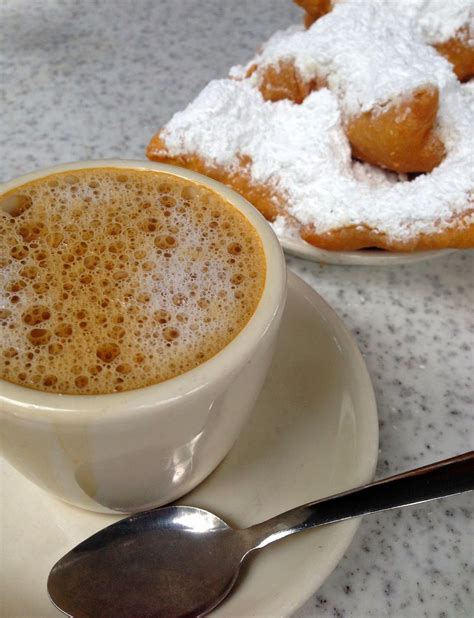 Beignets And Cafe Au Lait At Cafe Du Monde In New Orleans Cafe Du