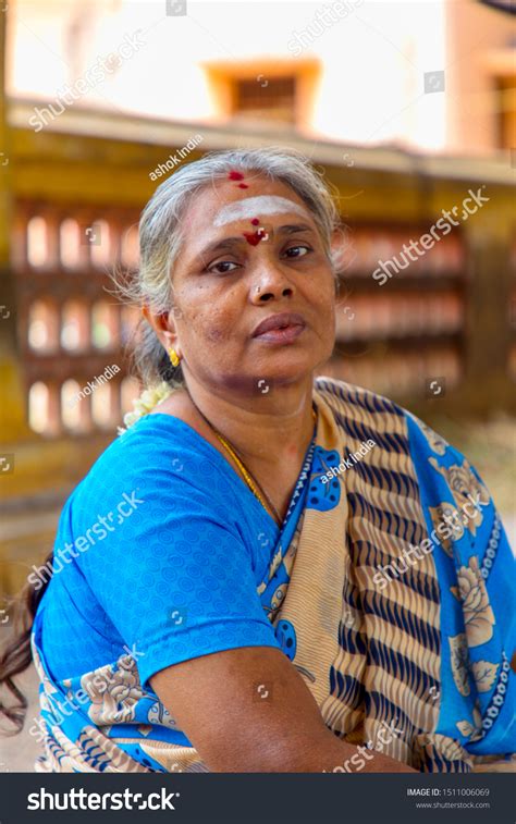 Smiling Mature Indian Woman Looking Directly Stock Photo