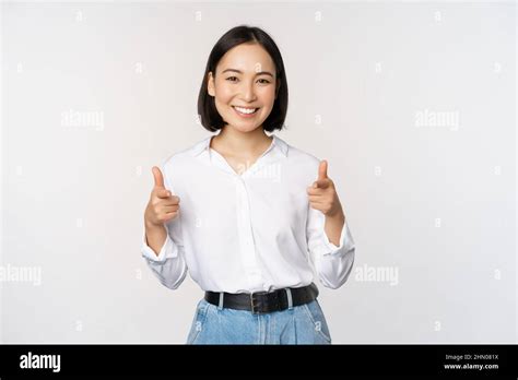 Its You Congrats Smiling Attractive Asian Woman Businesswoman Pointing Fingers At Camera With