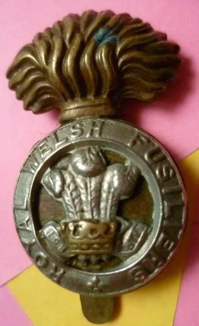 Ww1 Royal Welsh Fusiliers Regiment Cap Badge Bi Metal Slider Antique