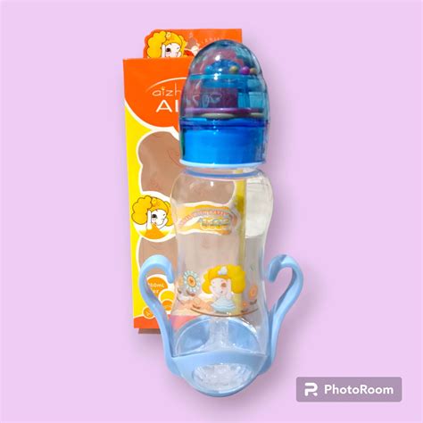 Botol Susu Dengan Pegangan Grip Dan Pelindung Alas Botol Dan