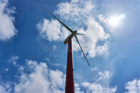 Wind Turbine Against Dramatic Sky With Clouds Stock Image Image Of