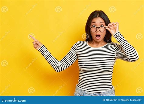 Indoor Shot Of Amazed European Brunette Woman In Transparent Eyewear