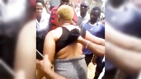 Pussy And Ass Exposed As Nigerian Whore Is Stripped Naked And Beaten In