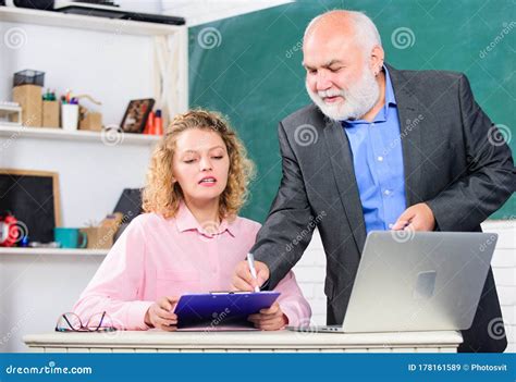Pass Exam Man Mature School Teacher And Girl With Laptop High School College University Stock