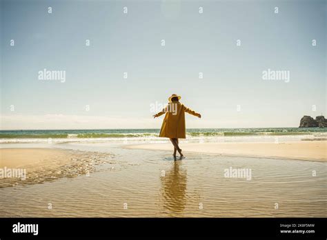 Mature Woman Enjoying Vacations At Beach On Sunny Day Stock Photo Alamy