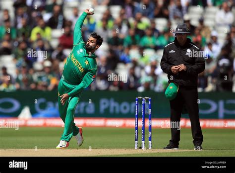 Pakistans Mohammad Hafeez In Bowling Action During The Icc Champions
