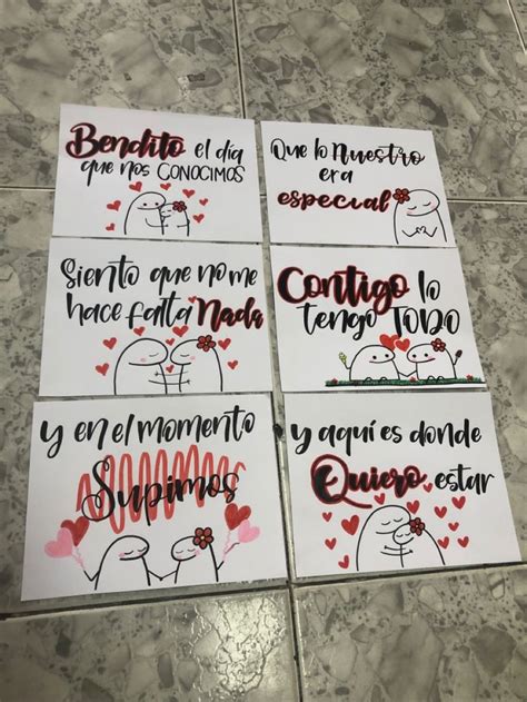 Four Stickers With Spanish Words On Them Sitting On The Floor Next To