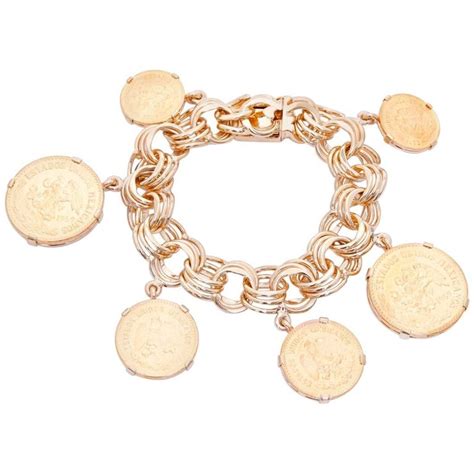 18 Karat Yellow Gold Charm Mexican Coin Bracelet At 1stdibs Mexican Gold Coin Bracelet Gold