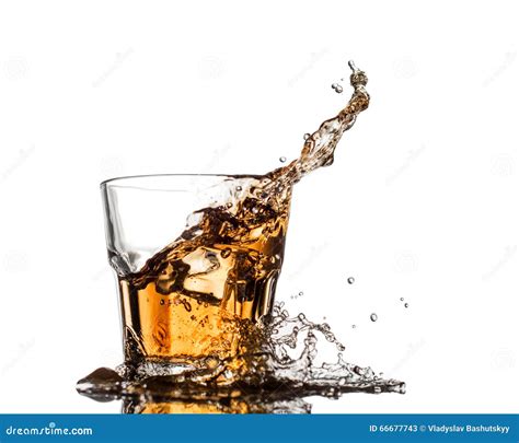 Glass Of Whiskey With Splash Isolated On White Background Stock Image