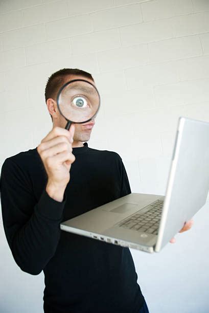 Royalty Free Snooping Computer Spy Surprised Eye In Magnifying Glass With Laptop Pictures ...