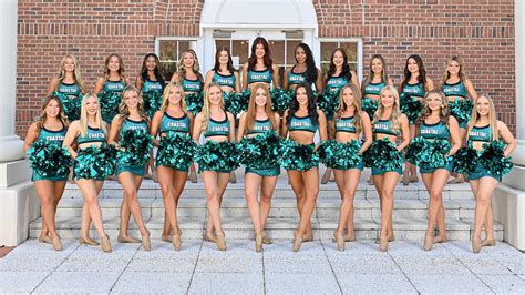 College Football Coach Explains Deleted Bikini Photo With Dancers