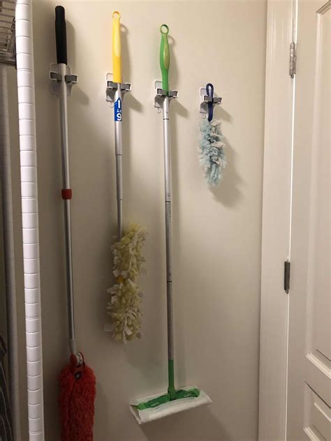 Command Broom And Mop Hangers Broom Storage Solution