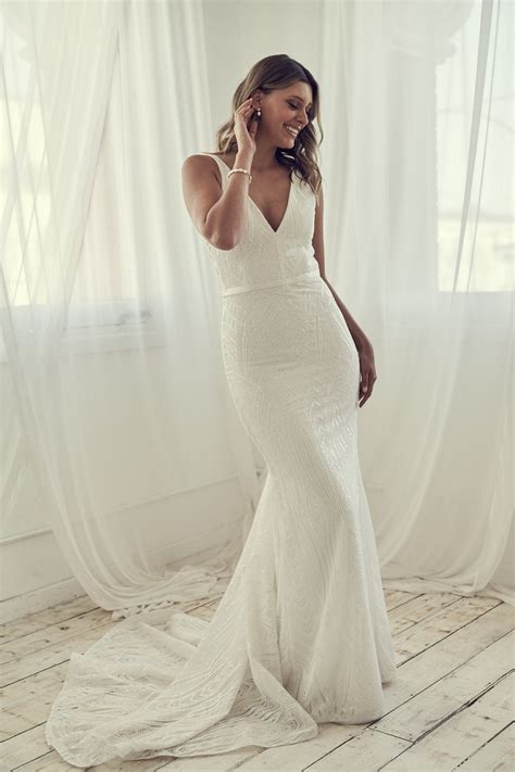 Beaded Sheath Wedding Dress With V Neckline And Open Back Kleinfeld