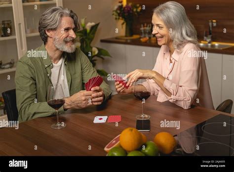 Joyful Married Mature Couple Playing Cards Together Stock Photo Alamy