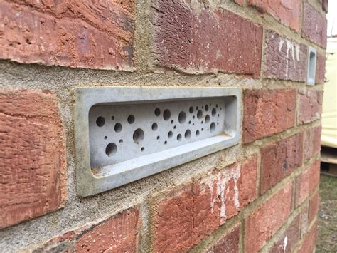 Tiny Holes Drilled Into Bricks Provide Miniature Homes For Solitary