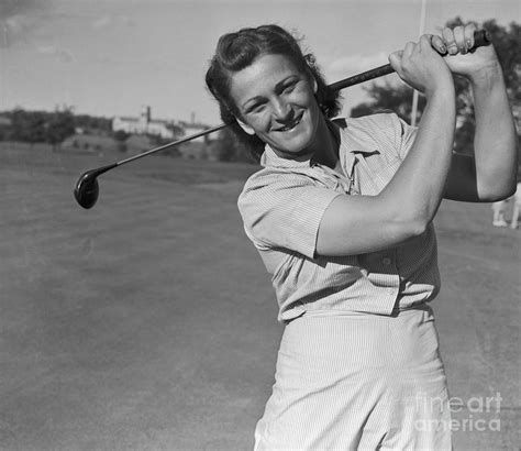 Babe Didrikson Smiling With Golf Club By Bettmann