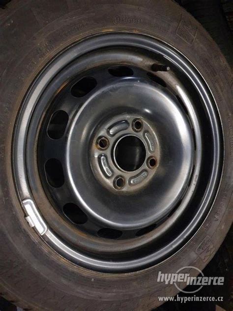 Plechove disky orig Ford 4x108 5 5jx14 et47 5 pneu zimní se bazar