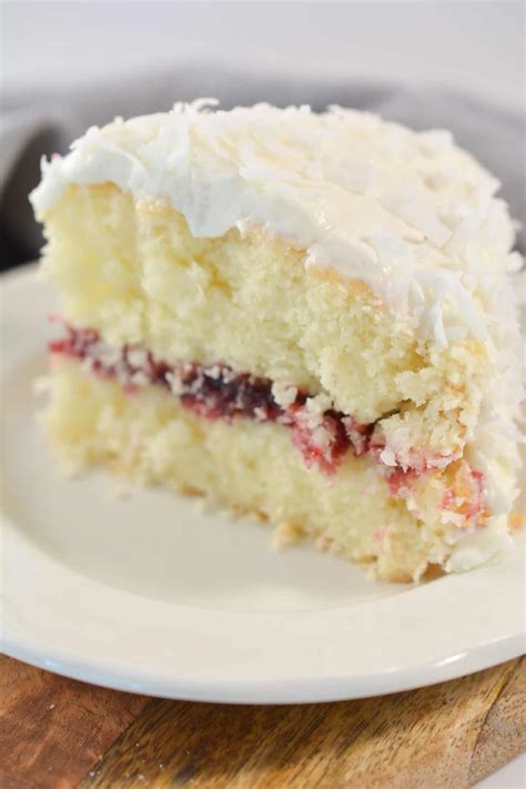 Coconut Cake With Raspberry Filling Sweet Pea S Kitchen