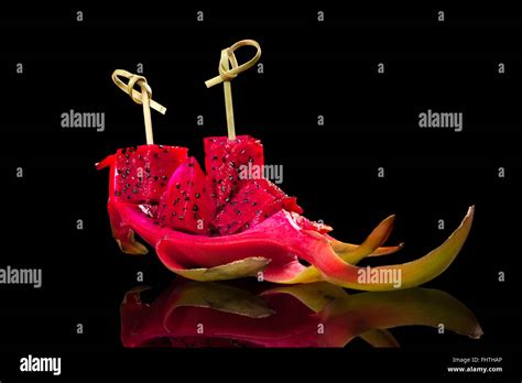 Pink dragon fruit isolated Stock Photo - Alamy