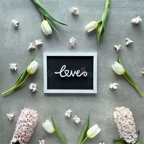 Spring Flowers And Chalkboard With Word Love Stock Image Image Of