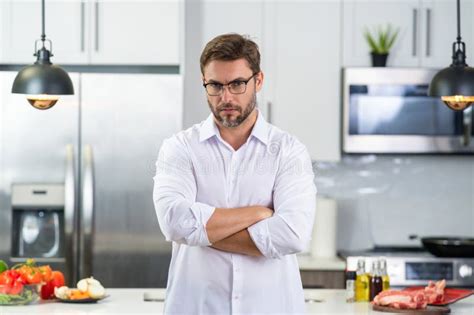 Chef Mature Man Cooking Food In Kitchen Handsome Man Preparing Healthy Food In Kitchen Guy