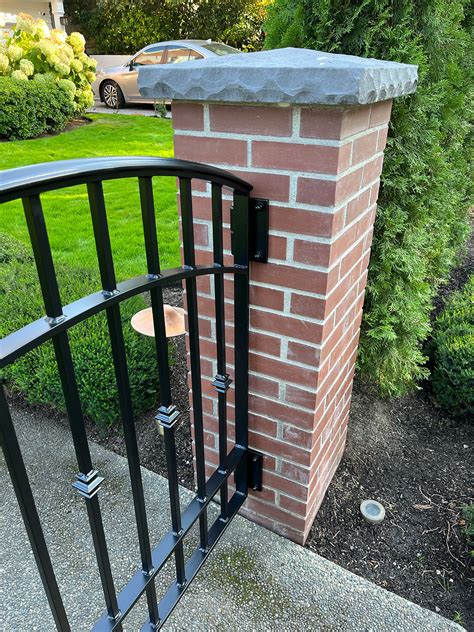 Iron Entry Gate Between Brick Columns Blackbird Iron And Design