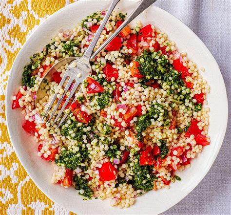 Giant Couscous Tomato Salad With Zhoug Style Dressing Good Food