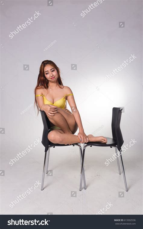Стоковая фотография 613302536 Sexy Asian Woman White Lingerie On