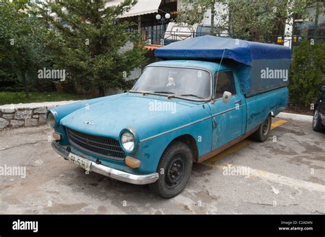 Old well used Peugeot converted to truck or lorry Stock Photo - Alamy