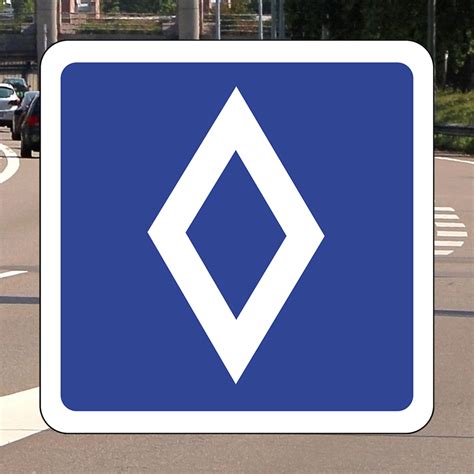 panneau de signalisation losange blanc sur fond bleu