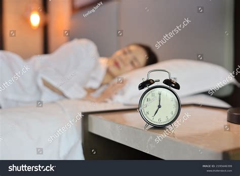 Alarm Clock Blurred Image Oversleeping Woman Stock Photo 2195646399