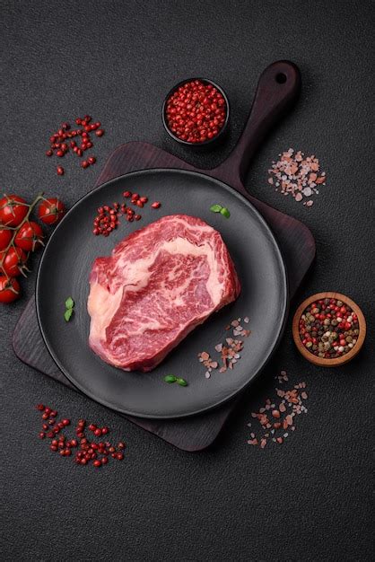 Premium Photo Fresh Juicy Raw Beef Striploin Steak With Salt And